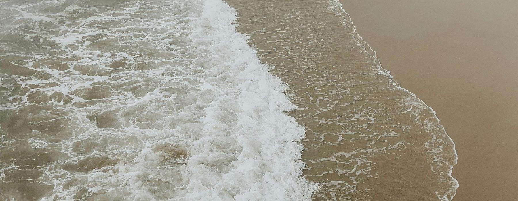 surf on a sandy beach