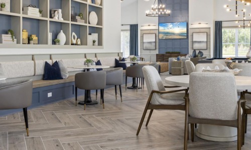 a large room with a table and chairs