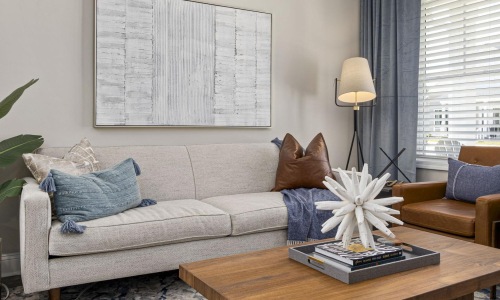 a living room with a whiteboard